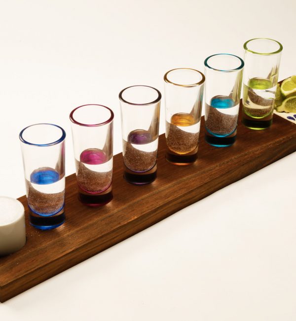 tequila flight boards with colorful shot glasses